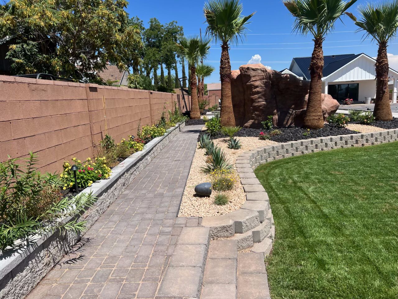 Beautiful garden with pathway, trees, and lawn